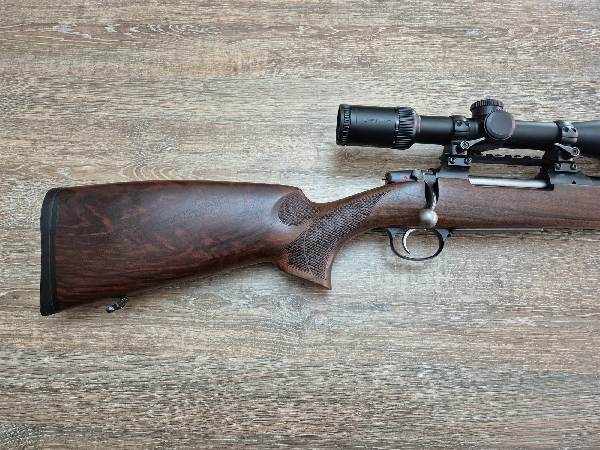 Carabina CZ 557 Lux, cal 30-06, 52cm, luneta Delta Titanium 2.5-15x50