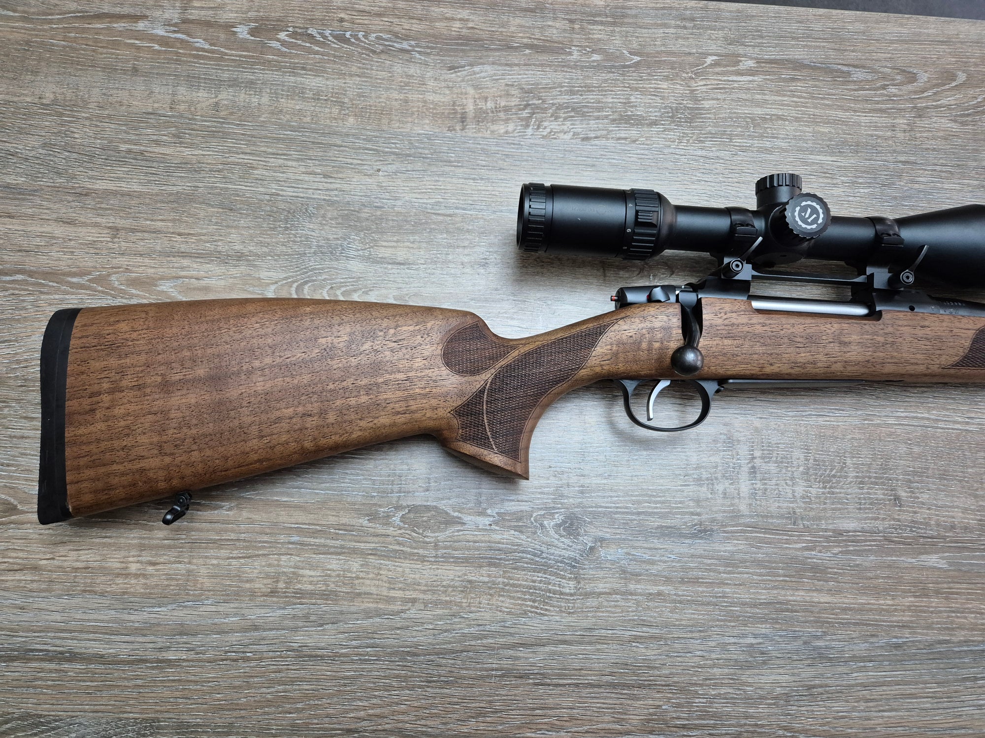 Carabina CZ 557 Lux, cal 8x57JS, 61cm, lemn, luneta 2-12x50