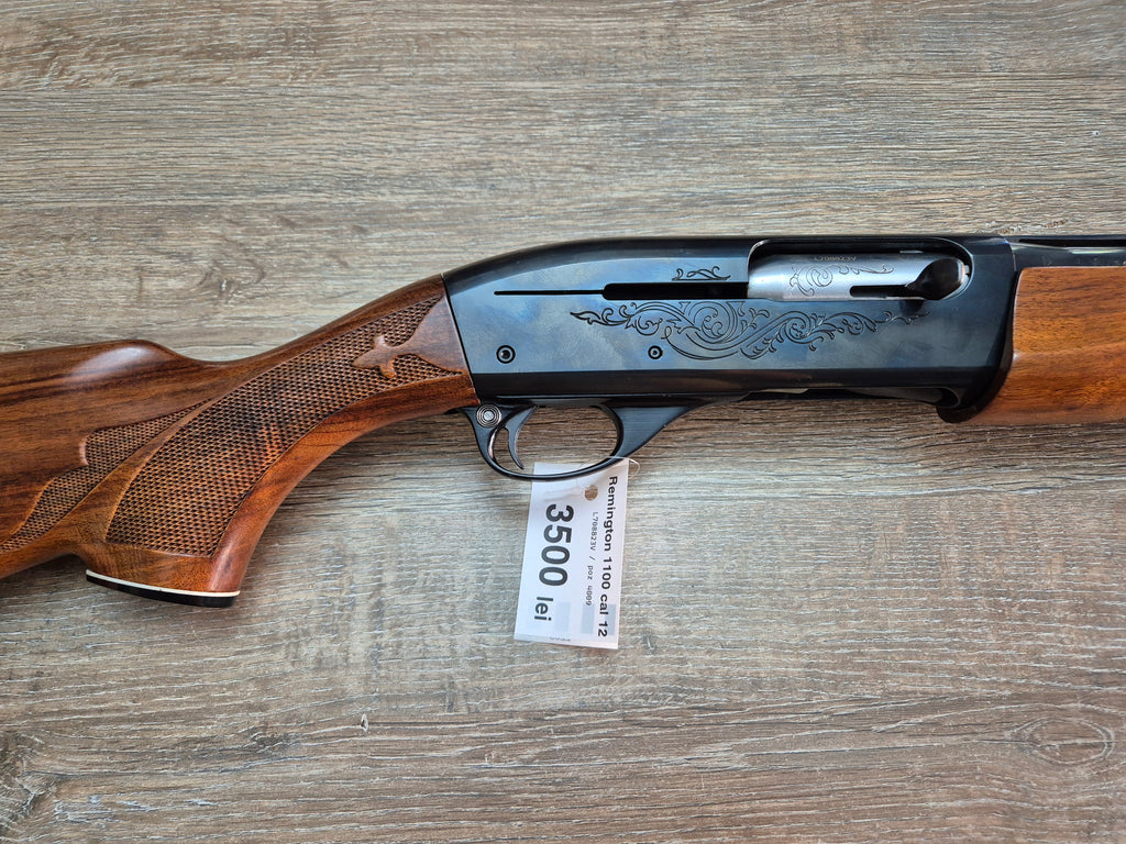 Lisa semiautomata Remington 1100, cal 12, teava 70cm, pat lemn