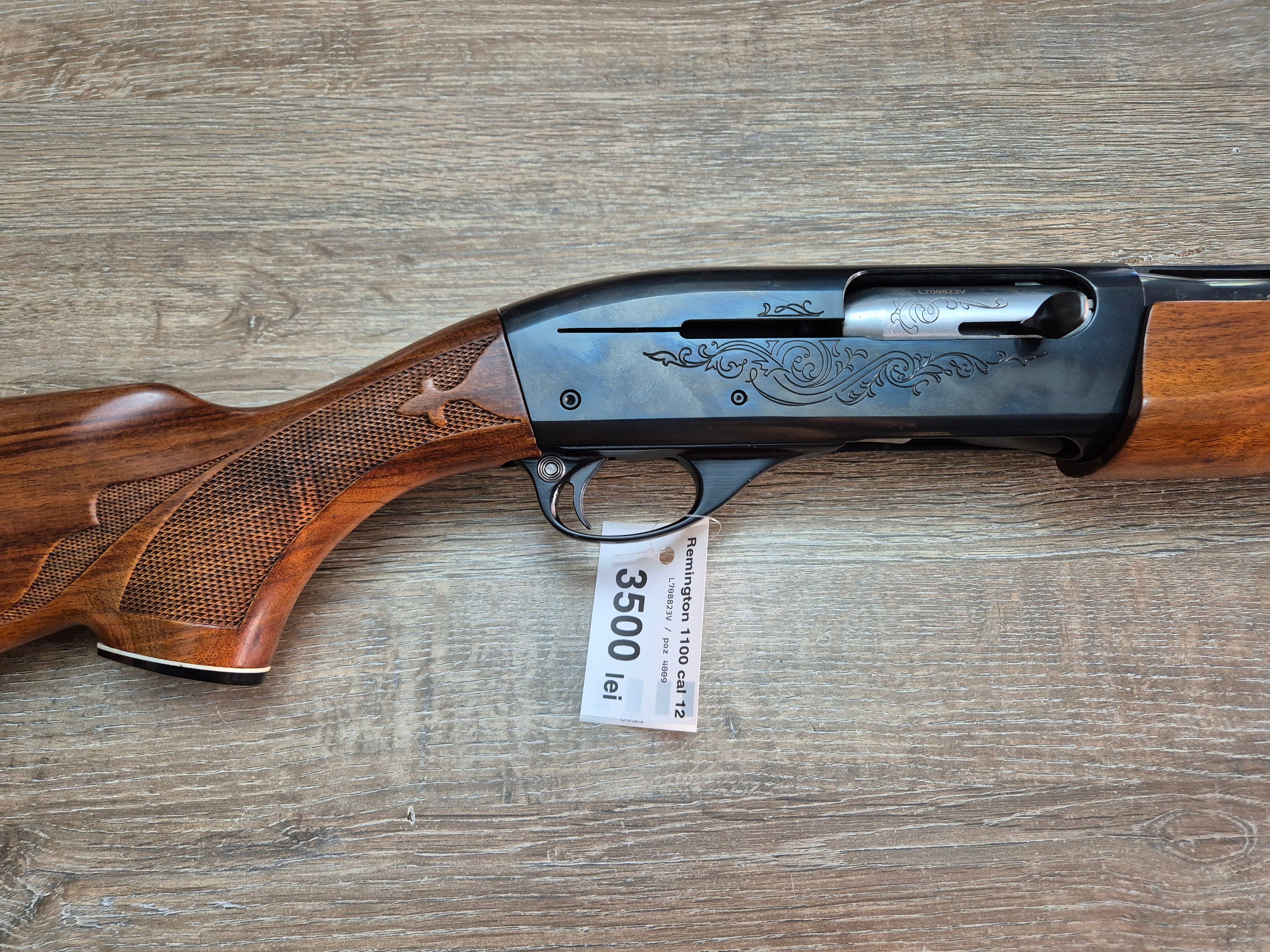 Lisa semiautomata Remington 1100, cal 12, teava 70cm, pat lemn