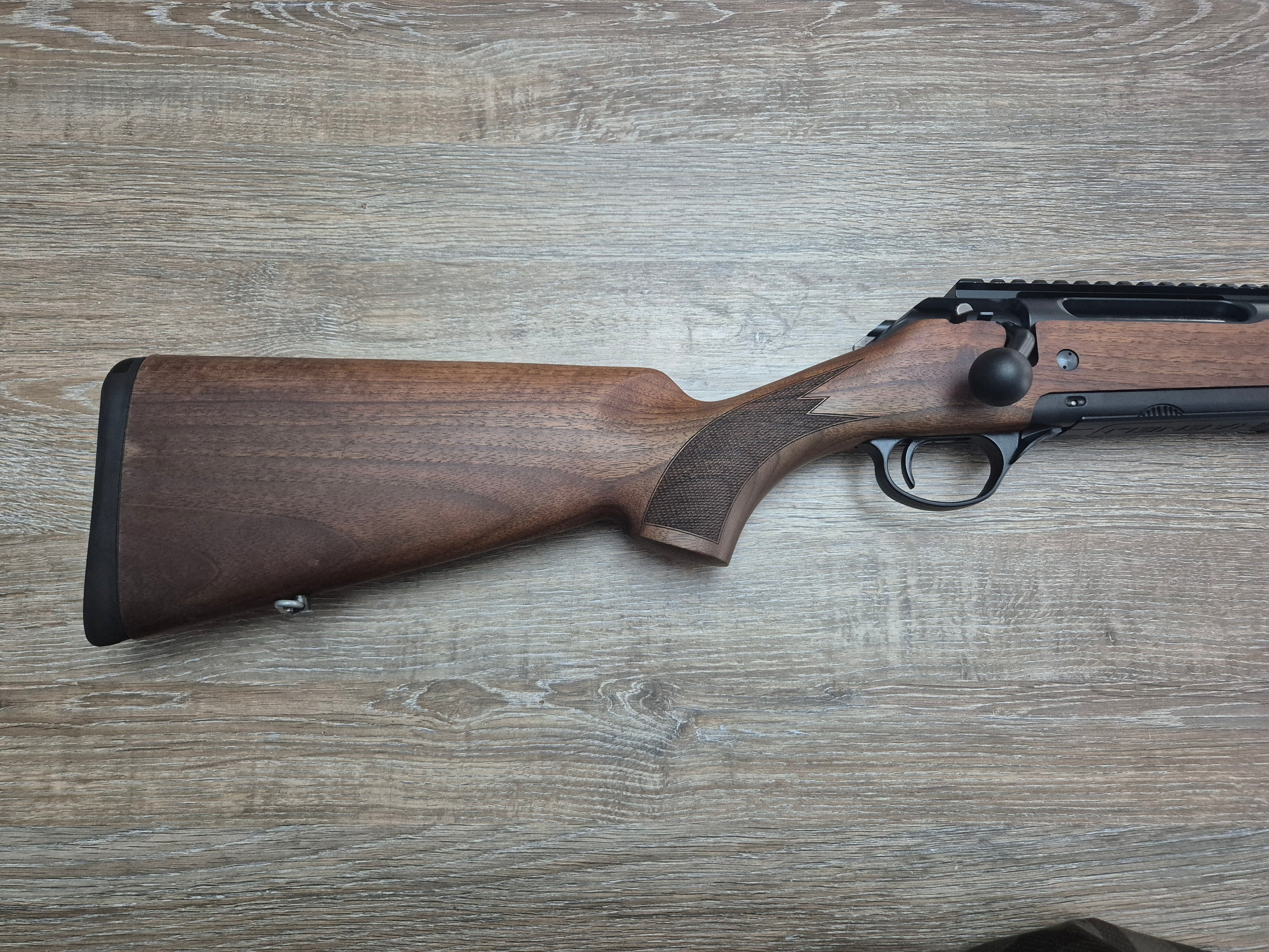 Carabina Haenel Jaeger 10, cal 7x64, 56cm, pat lemn, sina weaver inclusa