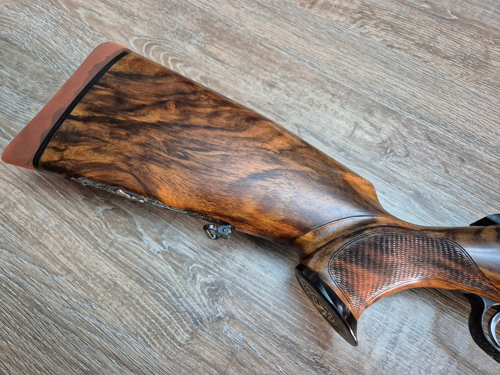 Carabina manufact. Krico, cal 6.5x68, teava 65cm, gravuri