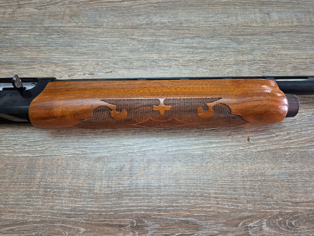Lisa semiautomata Remington 1100, cal 12, teava 70cm, pat lemn