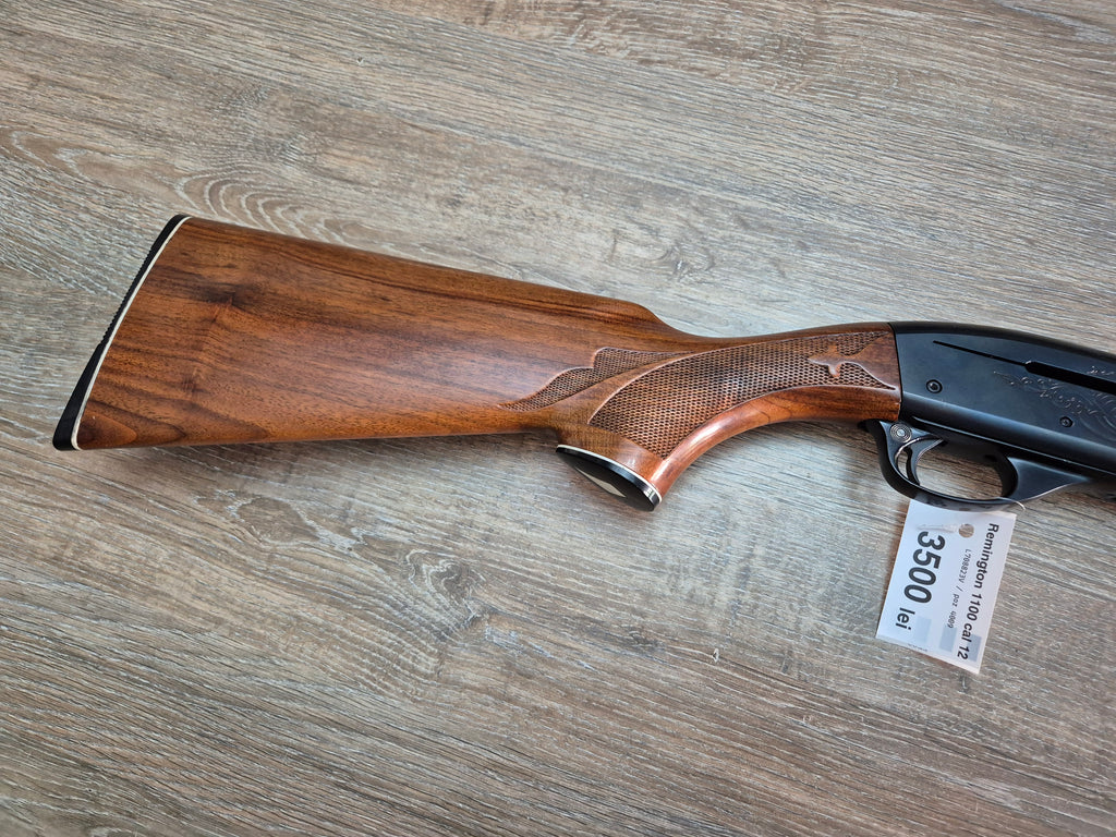 Lisa semiautomata Remington 1100, cal 12, teava 70cm, pat lemn